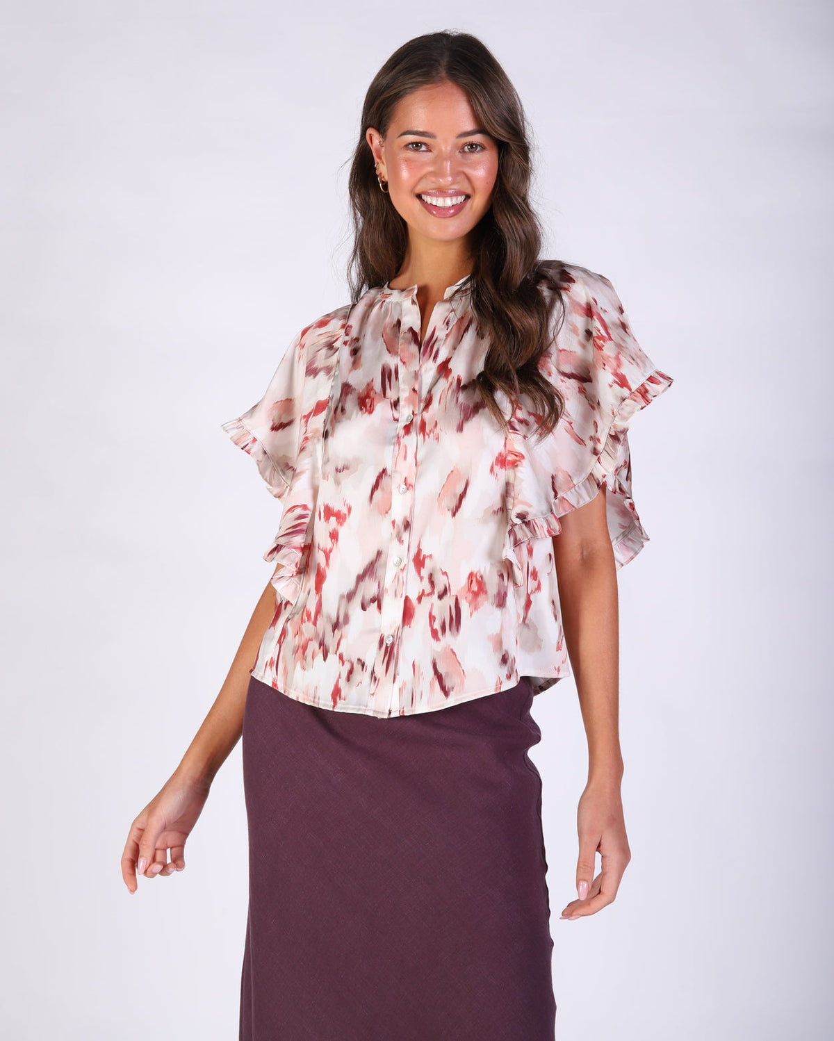 Model wearing a grey kimono style jacket from the sale collection